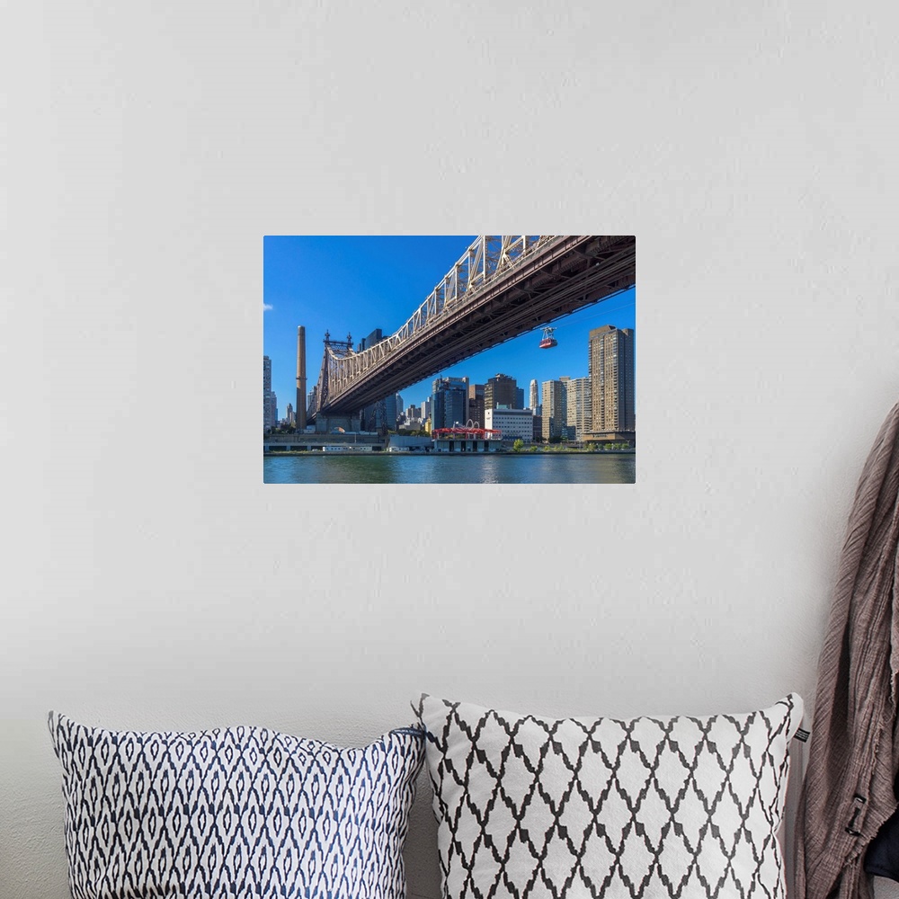 A bohemian room featuring New York, NYC, Manhattan, City skyline, Queensboro Bridge, and Roosevelt Island Tram viewed from ...