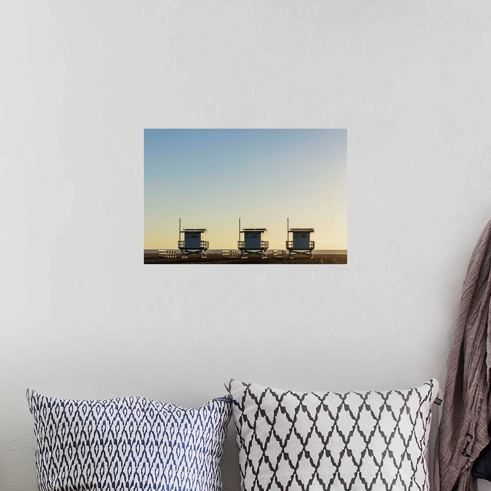 A bohemian room featuring USA, California, Los Angeles, Venice Beach, Lifeguard towers at sunset.