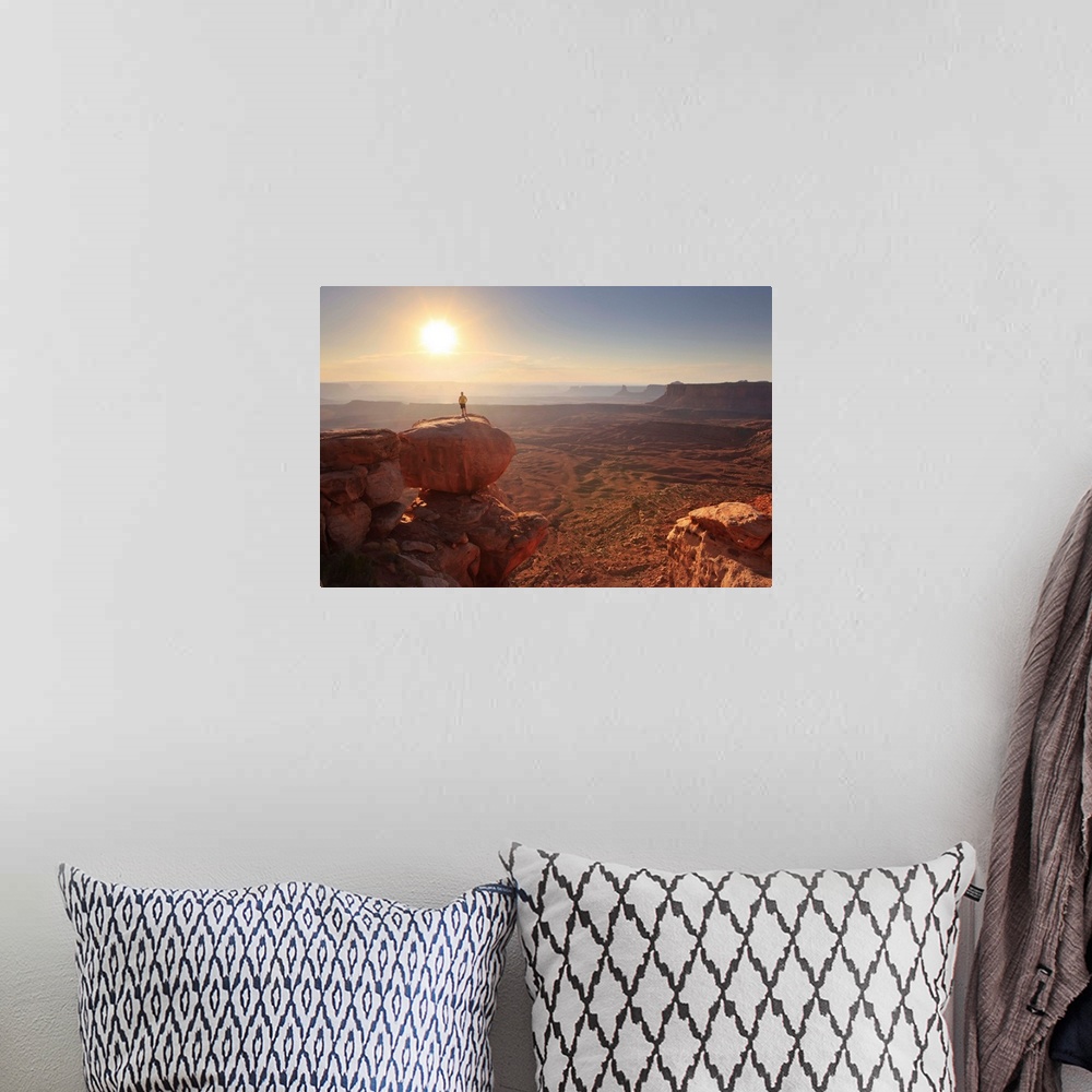A bohemian room featuring Utah, Canyonlands National Park, Hiker on a headland at Grand view overlook
