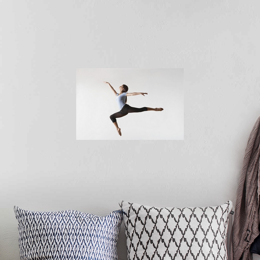 A bohemian room featuring Ballerina Leaping In Mid-Air