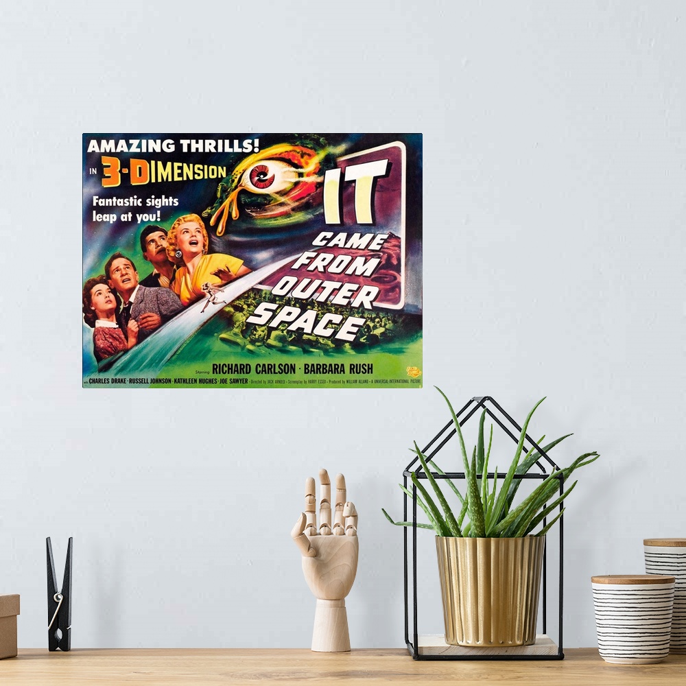 A bohemian room featuring It Came From Outer Space - Vintage Movie Poster