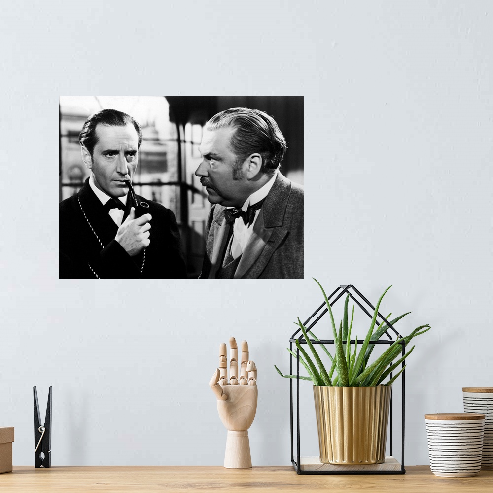 A bohemian room featuring The Adventures Of Sherlock Holmes, From Left: Basil Rathbone As Sherlock Holmes, Nigel Bruce As W...