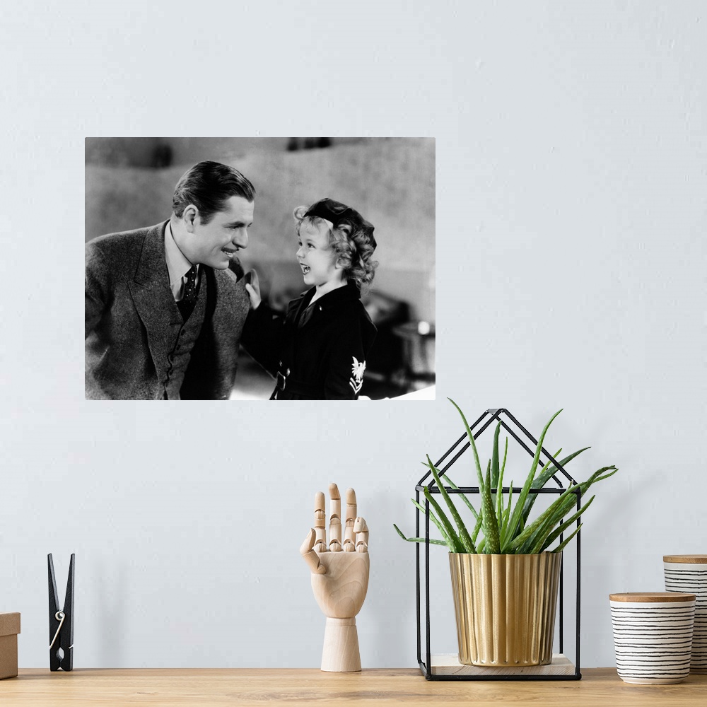 A bohemian room featuring Warner Baxter, Shirley Temple, Stand Up And Cheer