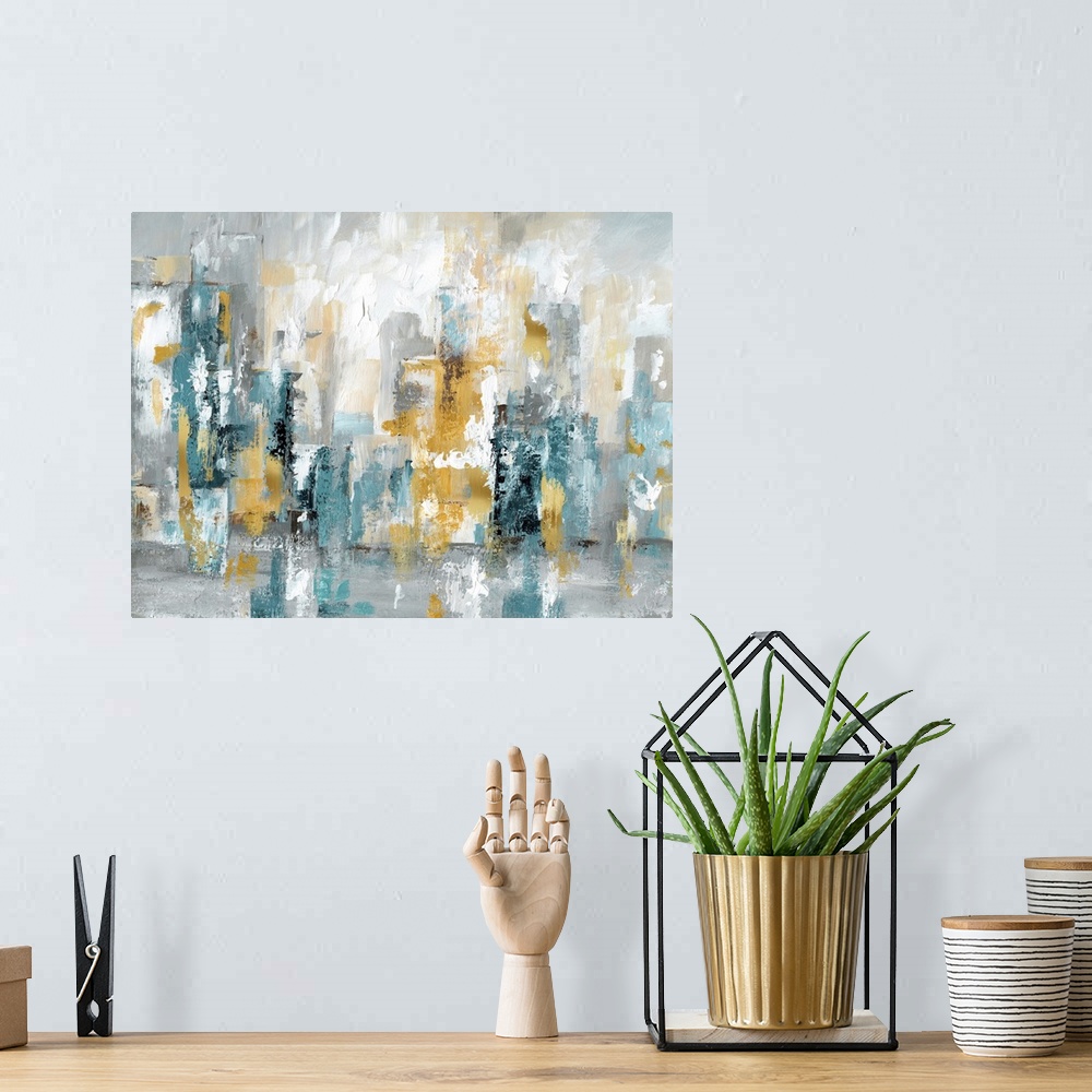A bohemian room featuring Large abstract cityscape in shades of blue, grey, and gold.