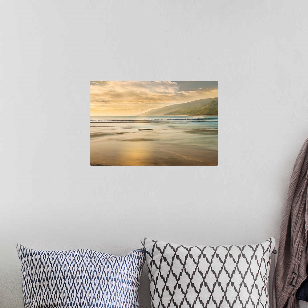 A bohemian room featuring Photograph of a shore with beautiful lighting and mountains in the background.
