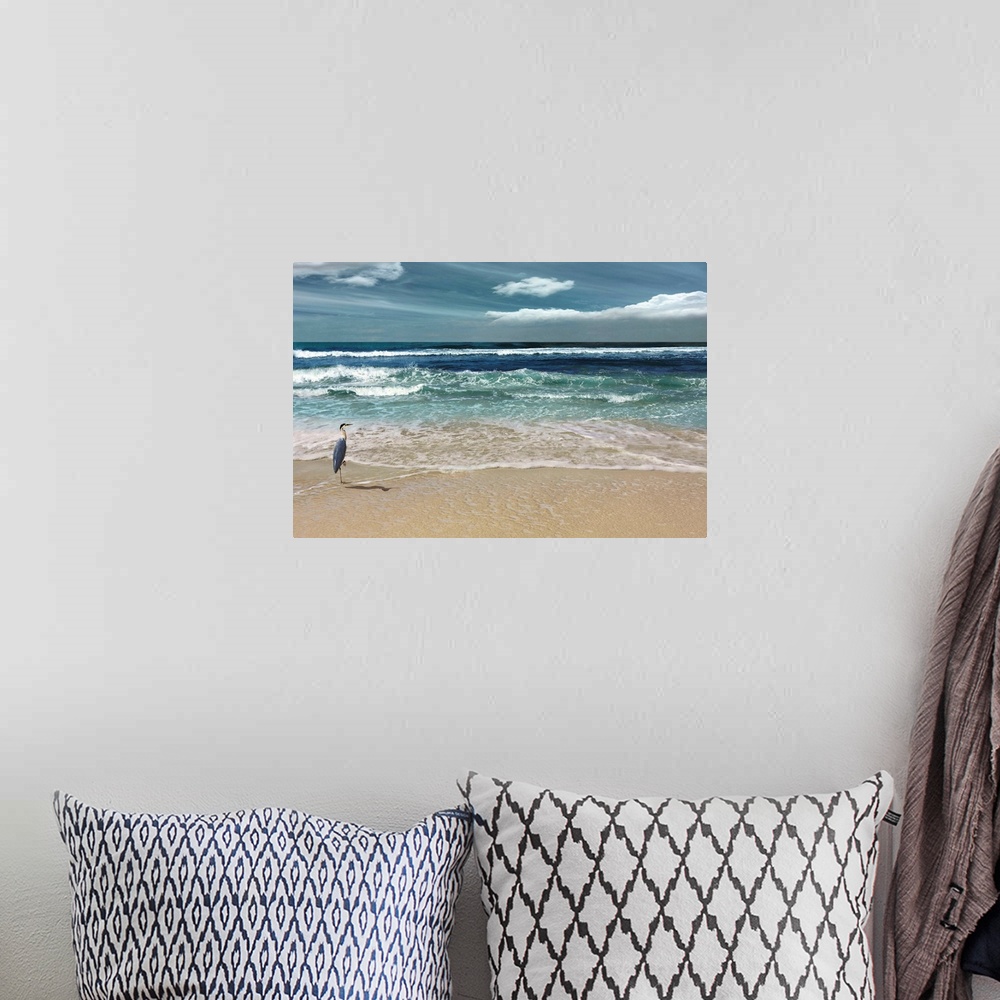 A bohemian room featuring This serene photo shows rippling waves as they approach the heron on the beach with white clouds ...