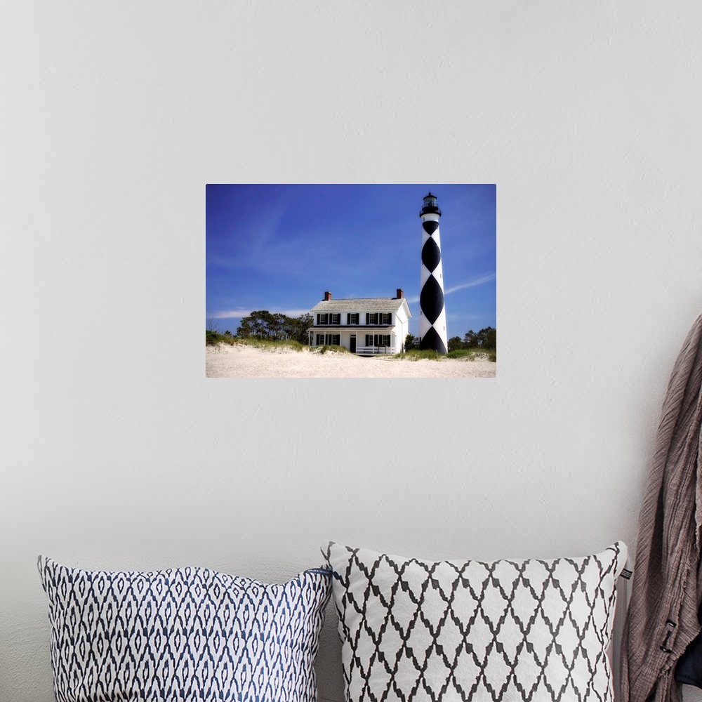 A bohemian room featuring Cape Lookout Light 1
