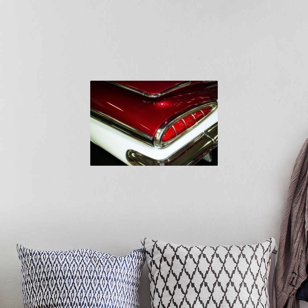 A bohemian room featuring Fine art photograph of the taillight of a vintage car.