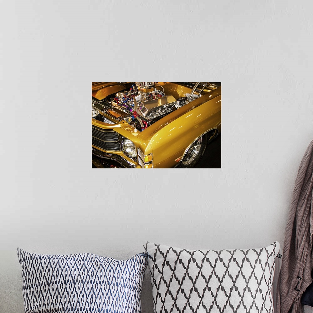 A bohemian room featuring Fine art photograph of a vintage car. The hood is popped and the engine is visible.