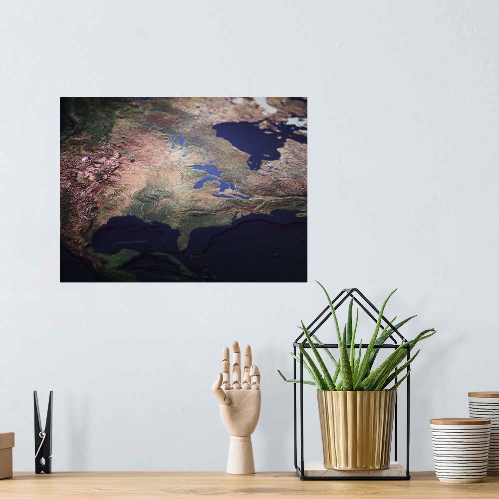 A bohemian room featuring A topographic map of USA from a satellite view