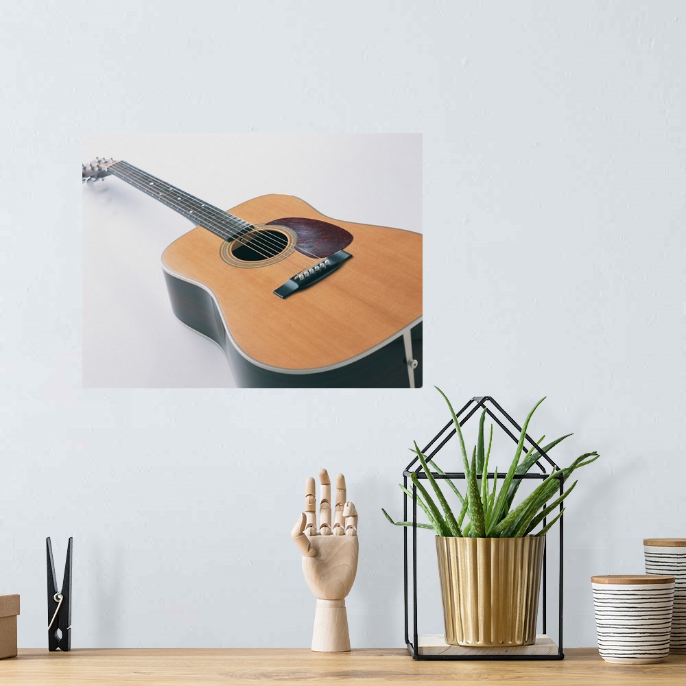 A bohemian room featuring Acoustic Guitar