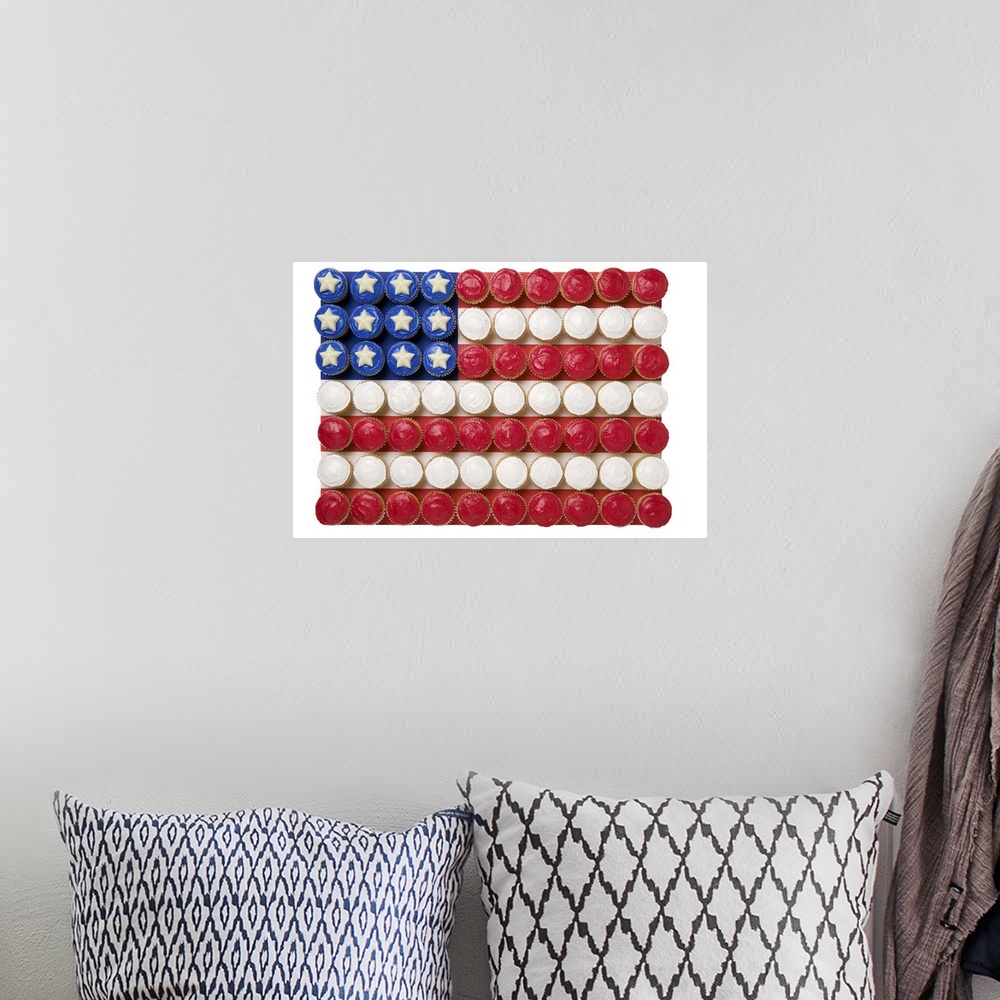 A bohemian room featuring American flag made of cupcakes