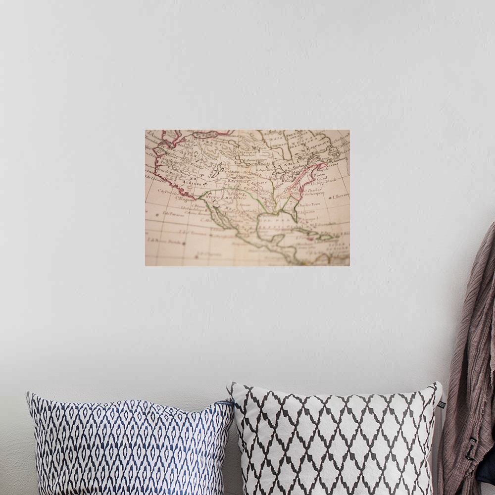 A bohemian room featuring Antique map of North America
