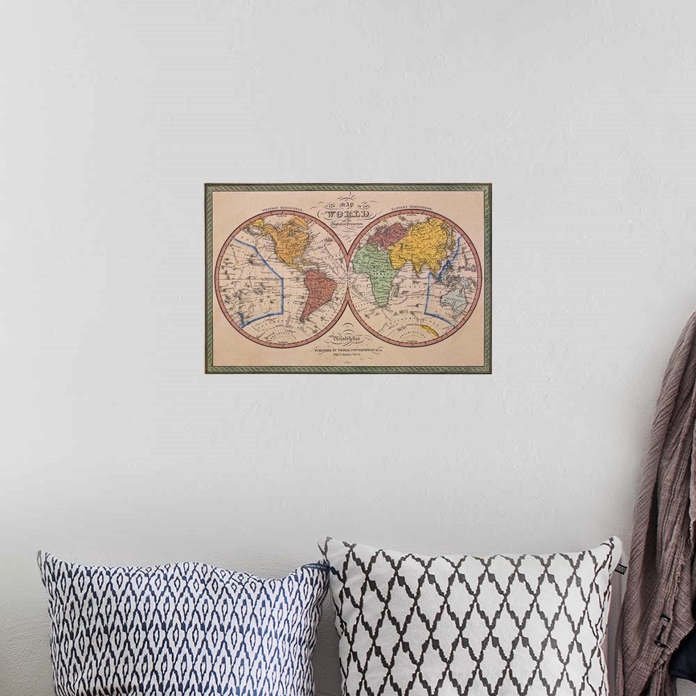 A bohemian room featuring Antique map of the world