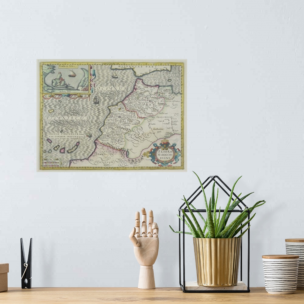 A bohemian room featuring Antique map of west Africa with present day Morocco and Canary Islands