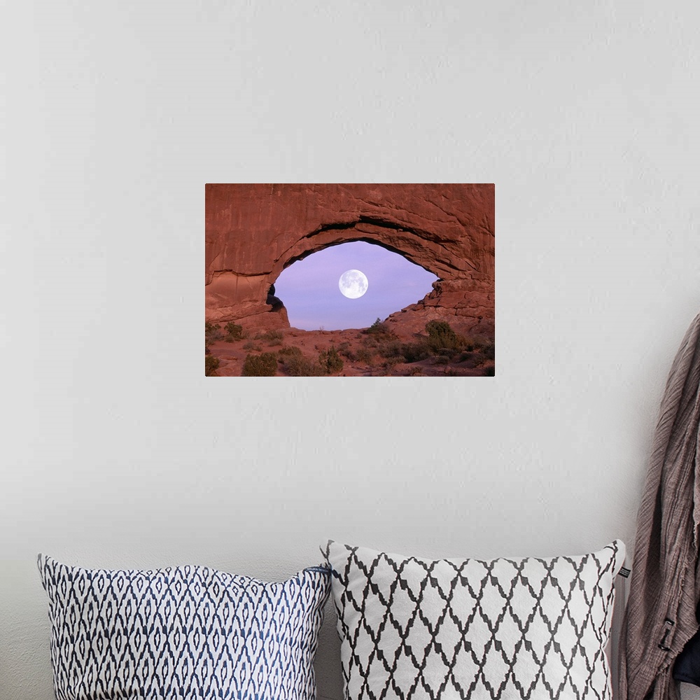 A bohemian room featuring PHOTOGRAPHER AT WINDOW AT ARCHES NATIONAL PARK