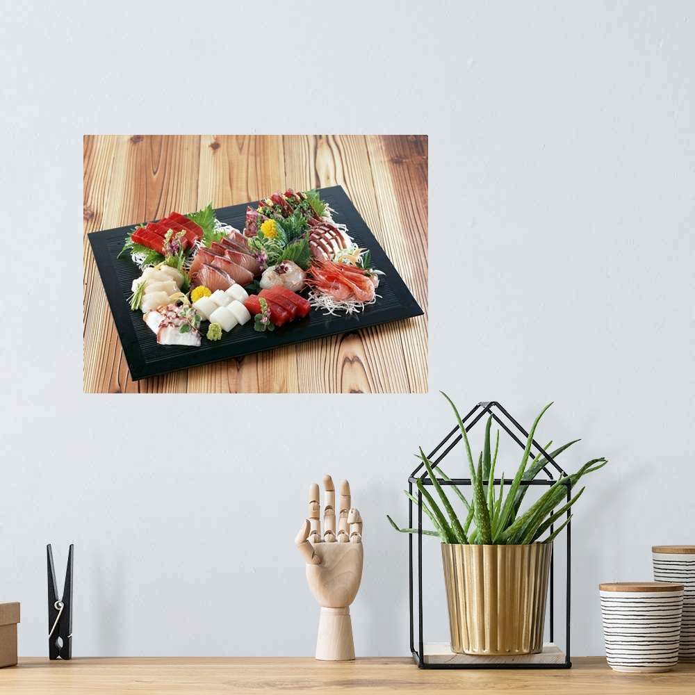 A bohemian room featuring Assorted sashimi