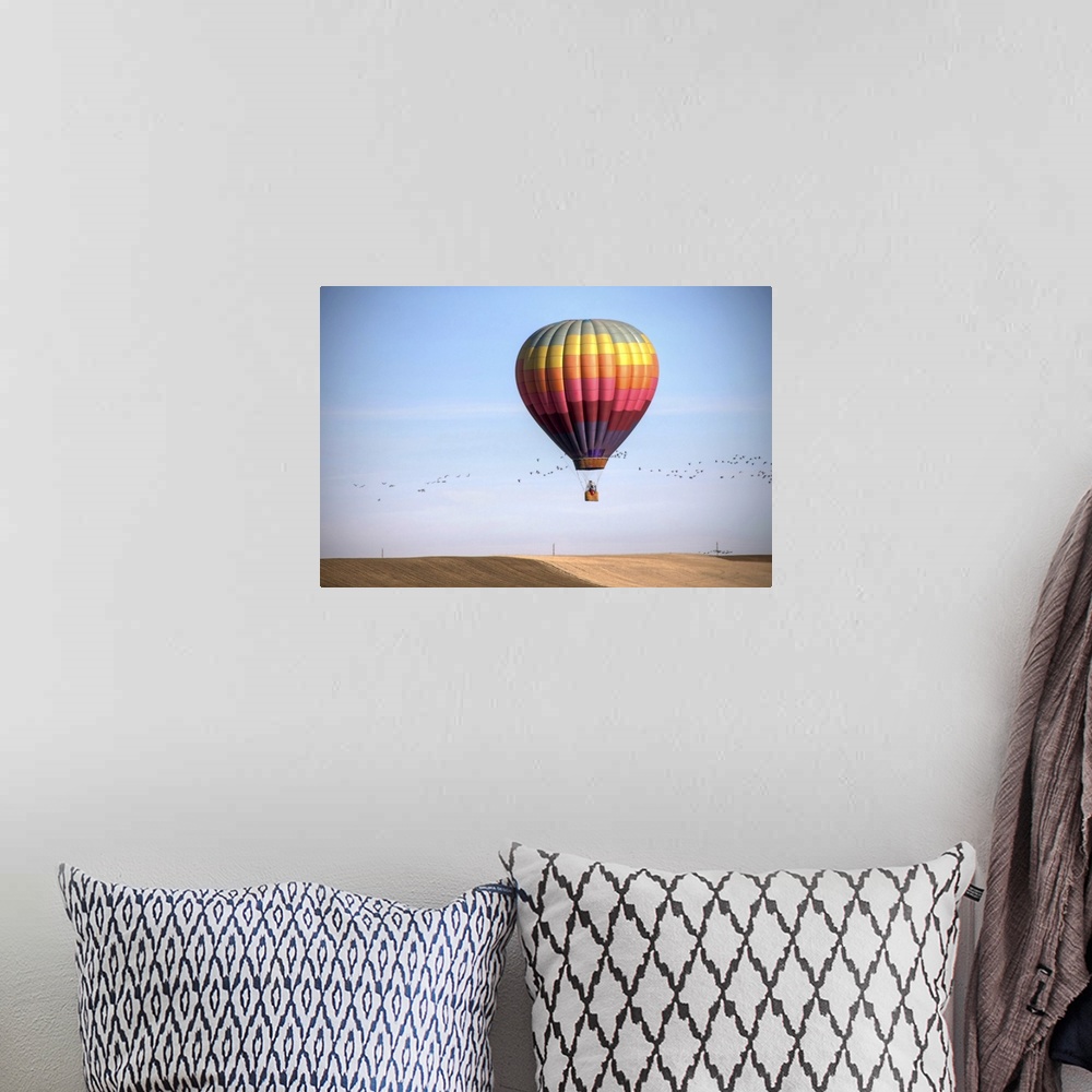 A bohemian room featuring Balloon over winter field in Colorado.