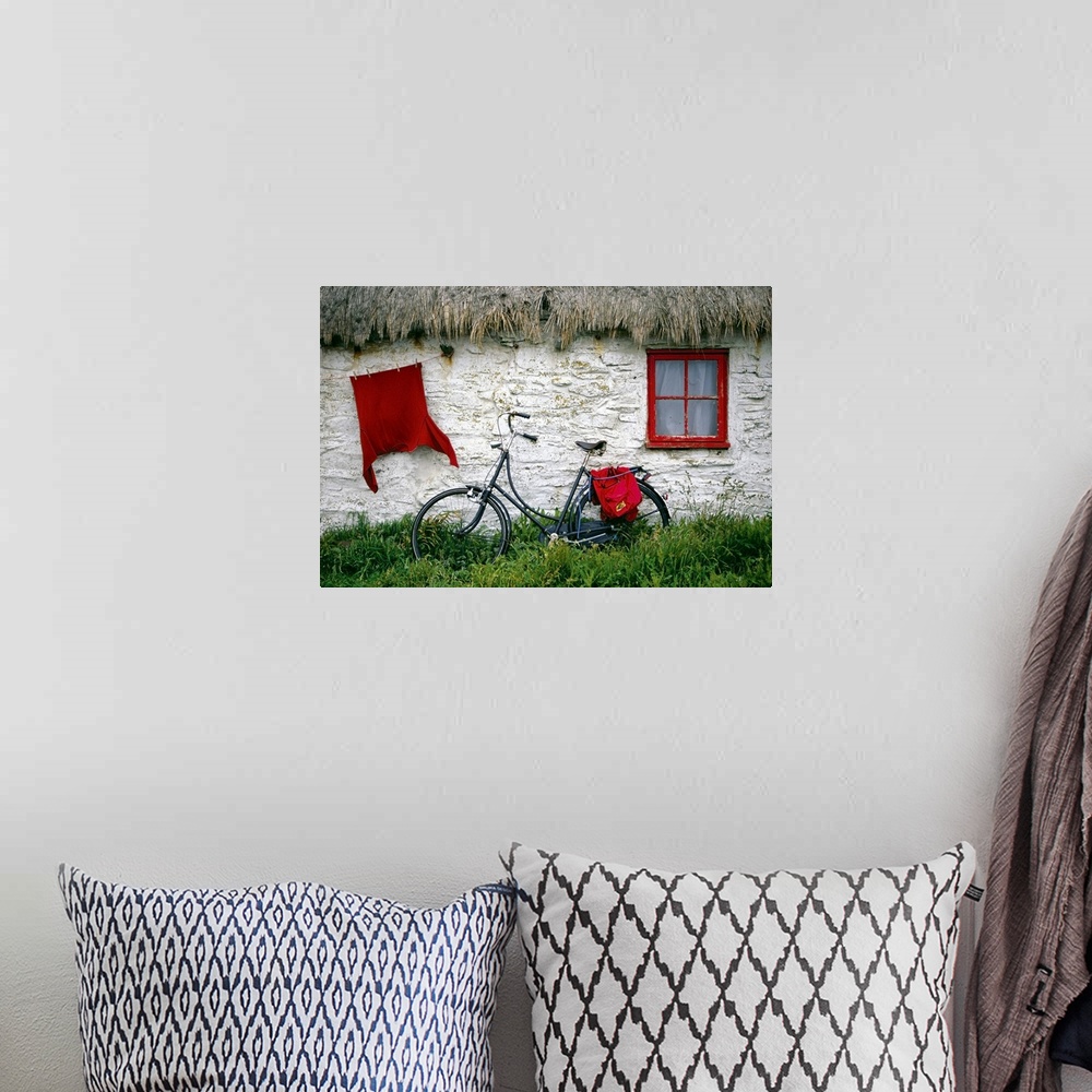 A bohemian room featuring Bicycle outside a cottage, Cregnesh, Isle of Man, British Isles