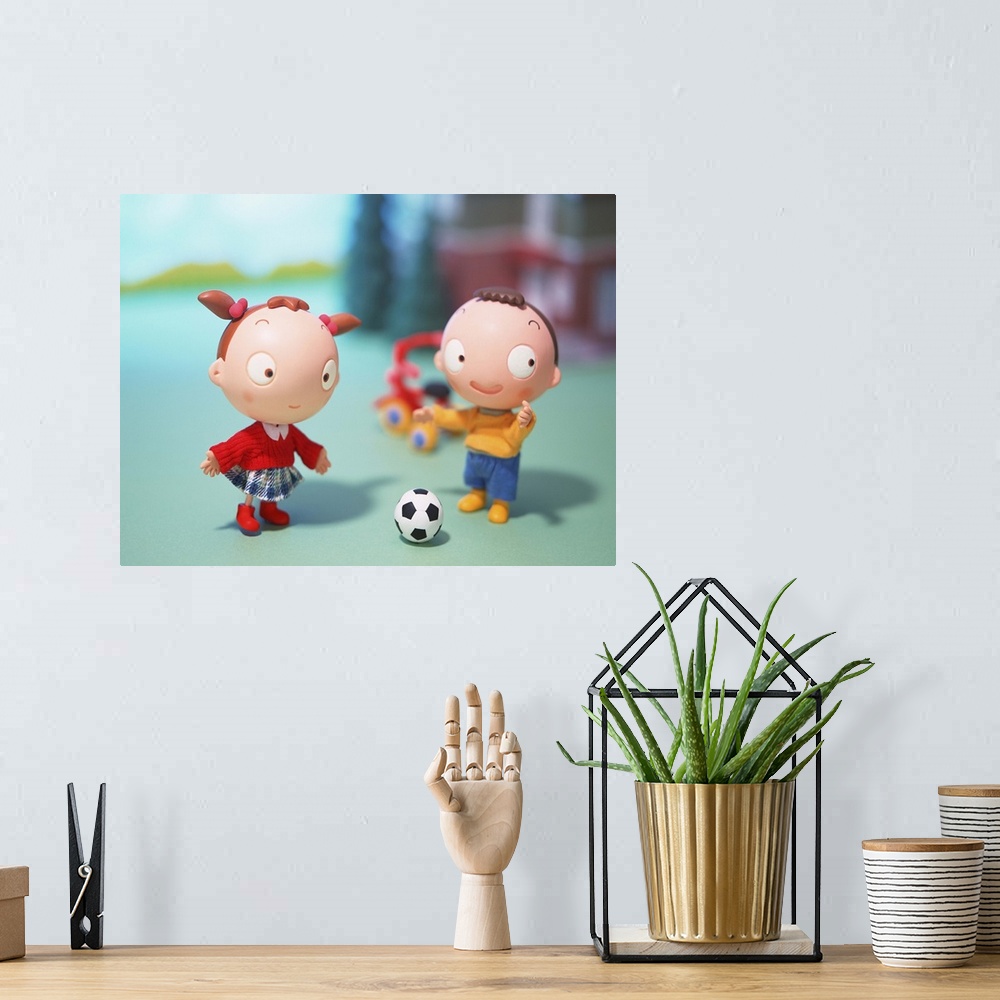 A bohemian room featuring Boy and Girl playing soccer