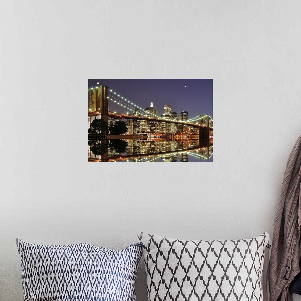 A bohemian room featuring Beautiful artwork for the home or office of the Brooklyn Bridge illuminated at night with the sky...