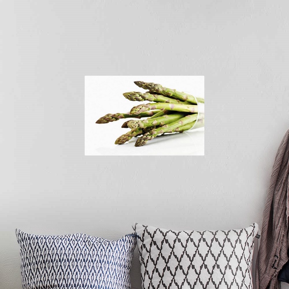 A bohemian room featuring Bunch of asparagus in beaker, close-up