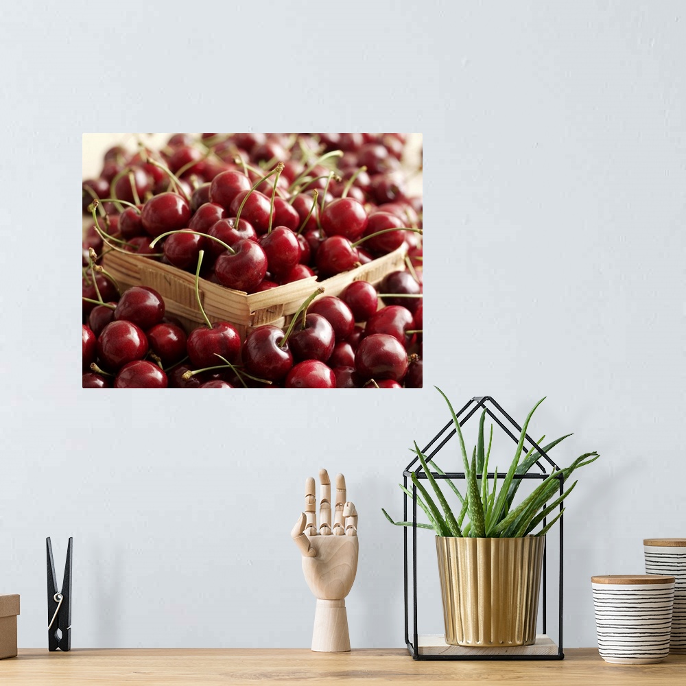 A bohemian room featuring Cherries in a basket