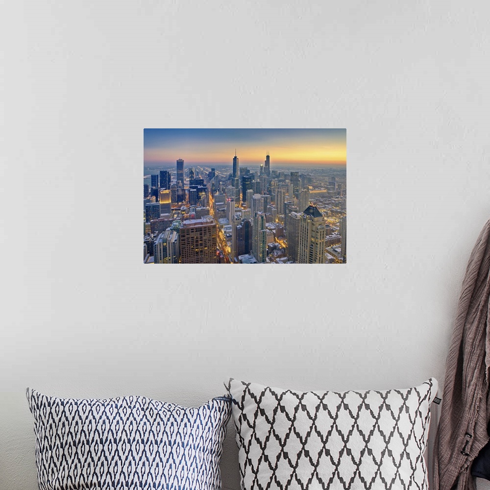 A bohemian room featuring Chicago skyline in blue hour.