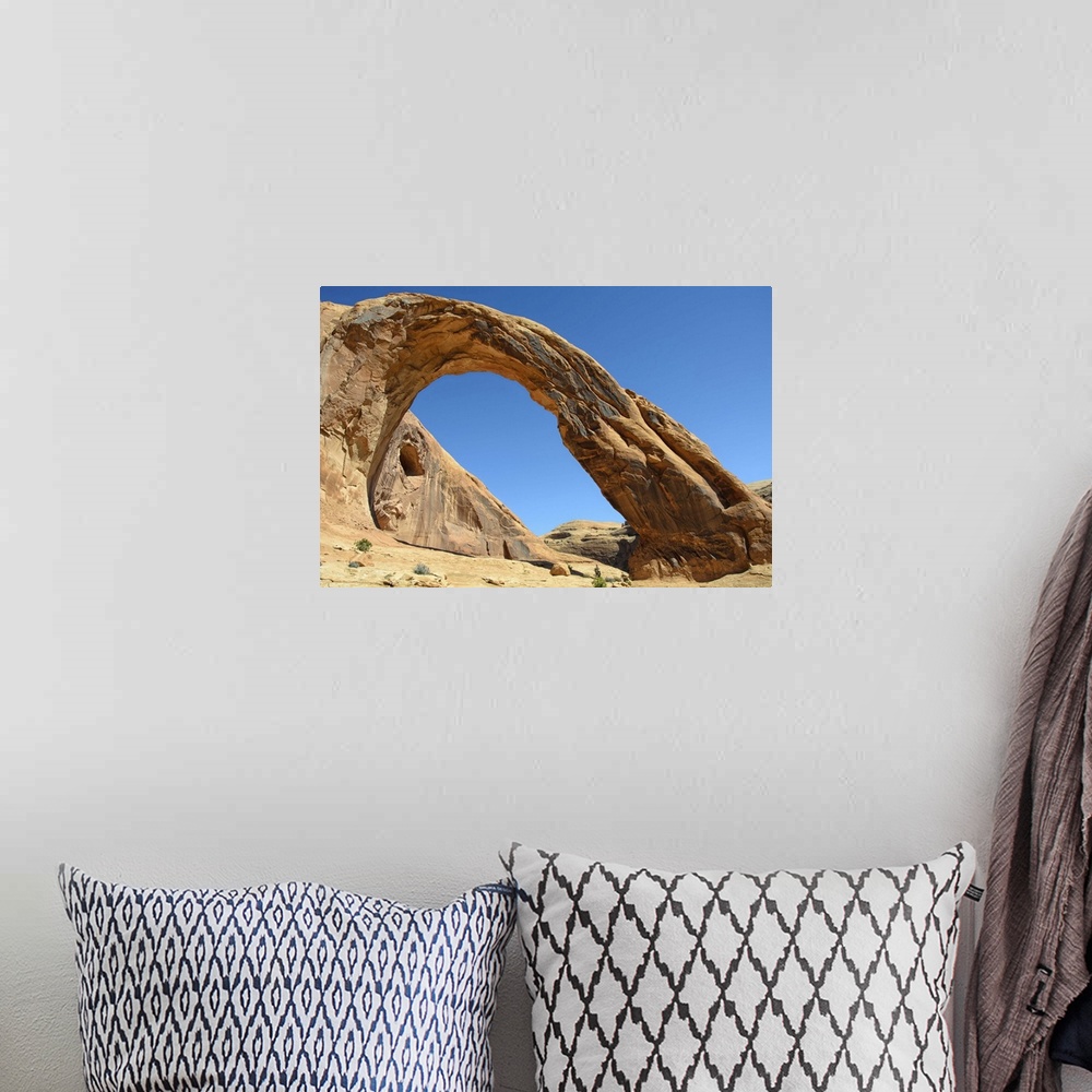 A bohemian room featuring Corona Arch against clear sky in Moab, Utah.