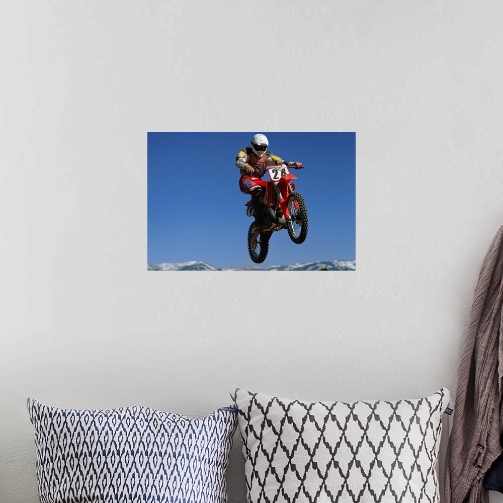 A bohemian room featuring Dirt biker in mid-air