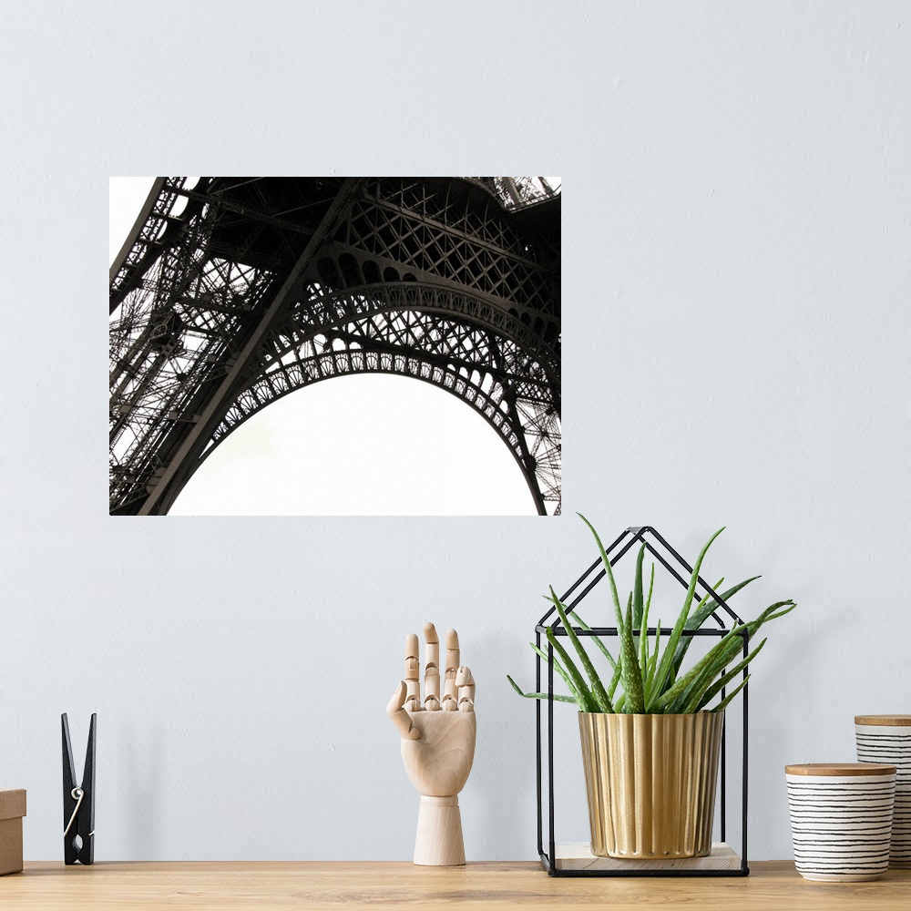 A bohemian room featuring Up-close photograph of architectural detail of iconic monument in Paris.
