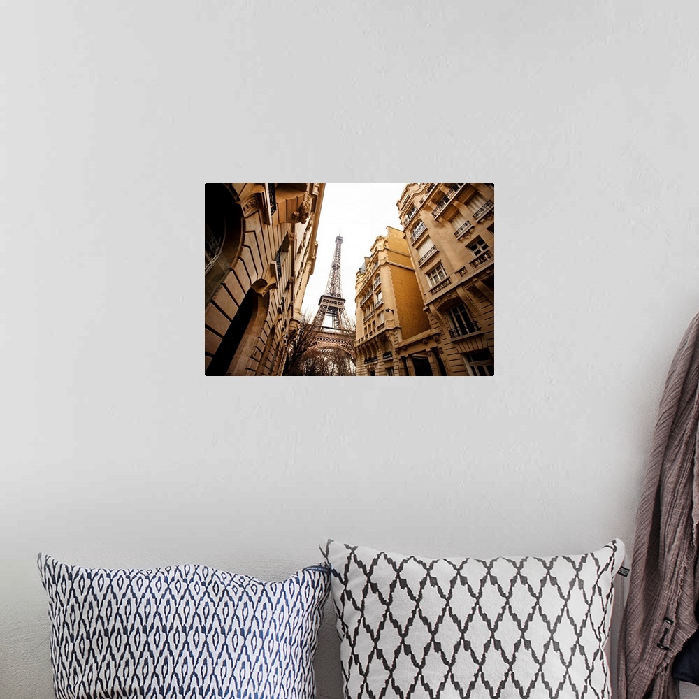 A bohemian room featuring Eiffel Tower and buildings.
