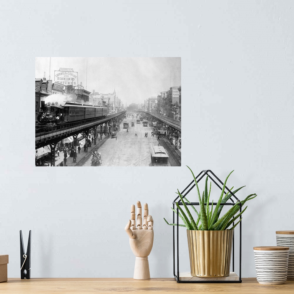 A bohemian room featuring Elevated trains roll over busy streets in Manhattan's Bowery neighborhood.