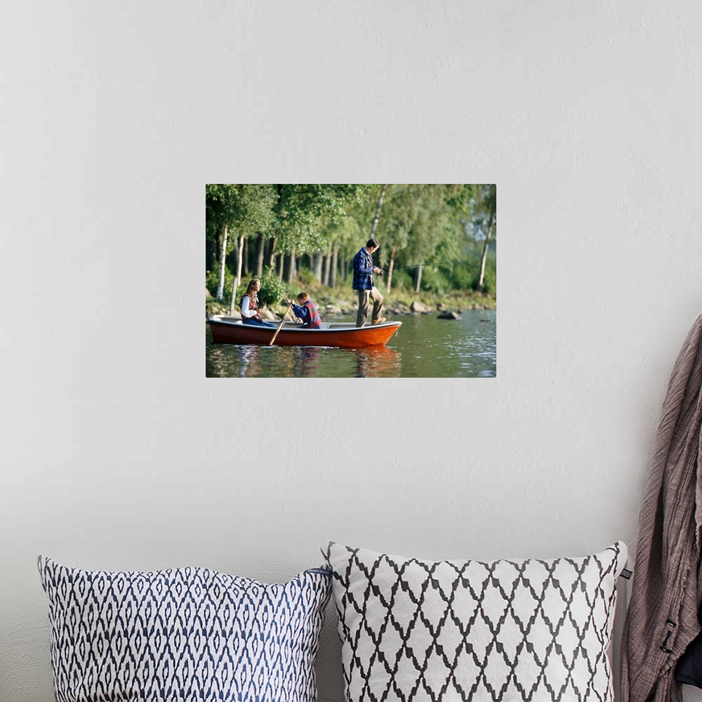 A bohemian room featuring Family fishing from boat