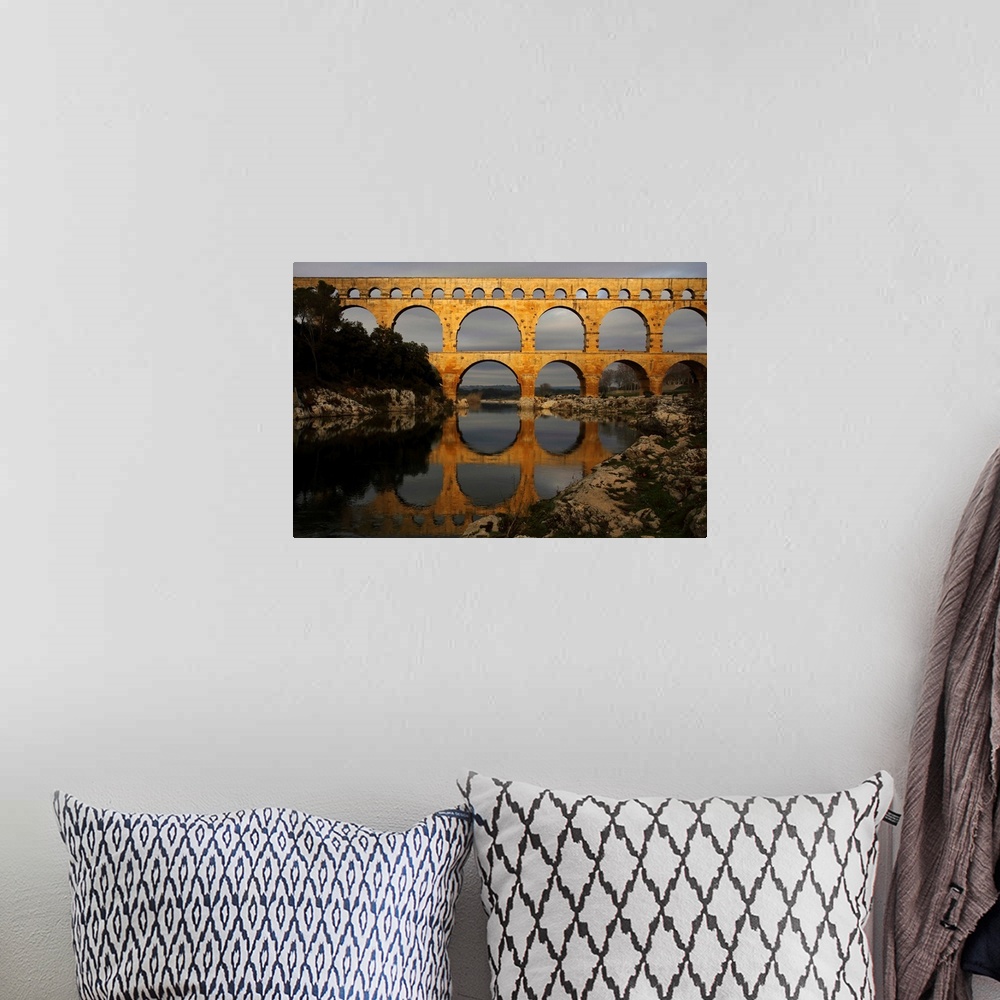 A bohemian room featuring France,Languedoc Roussillon,pont du Gard over river Gardon.