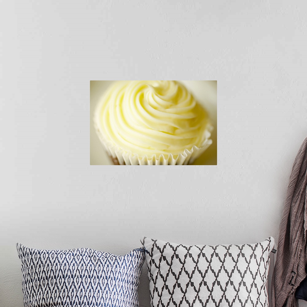 A bohemian room featuring Frosted cupcake