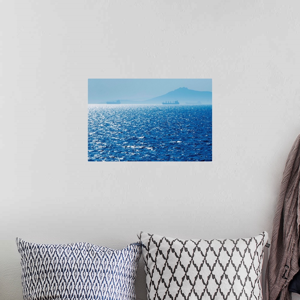 A bohemian room featuring Greece, Oil tankers and cargo ships on Aegean Sea