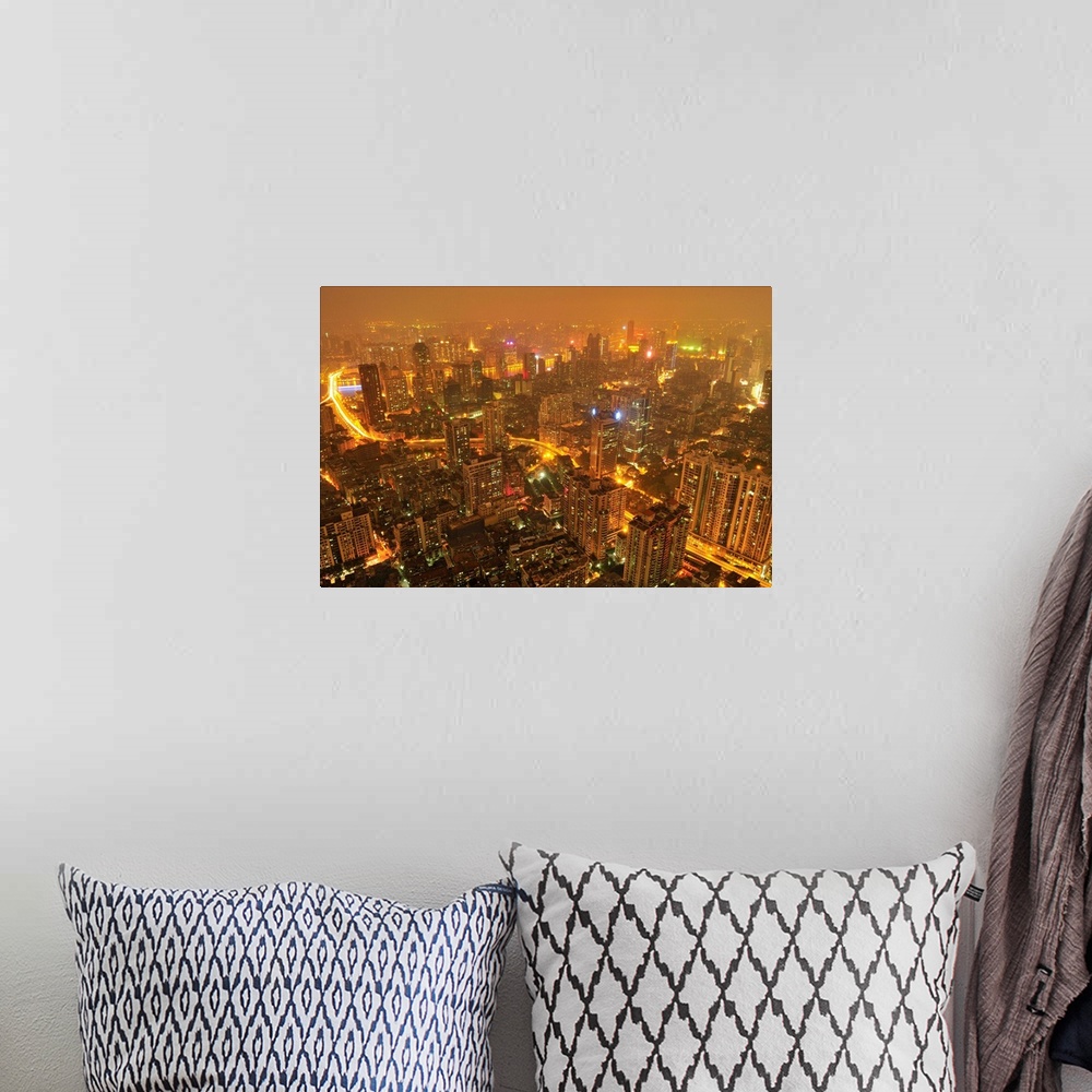 A bohemian room featuring Guangzhou skyline at night.