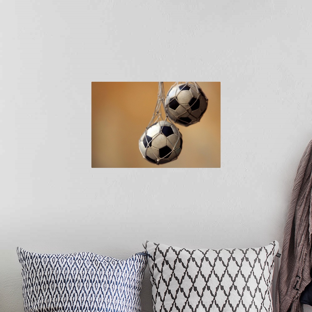 A bohemian room featuring Hanging soccer balls