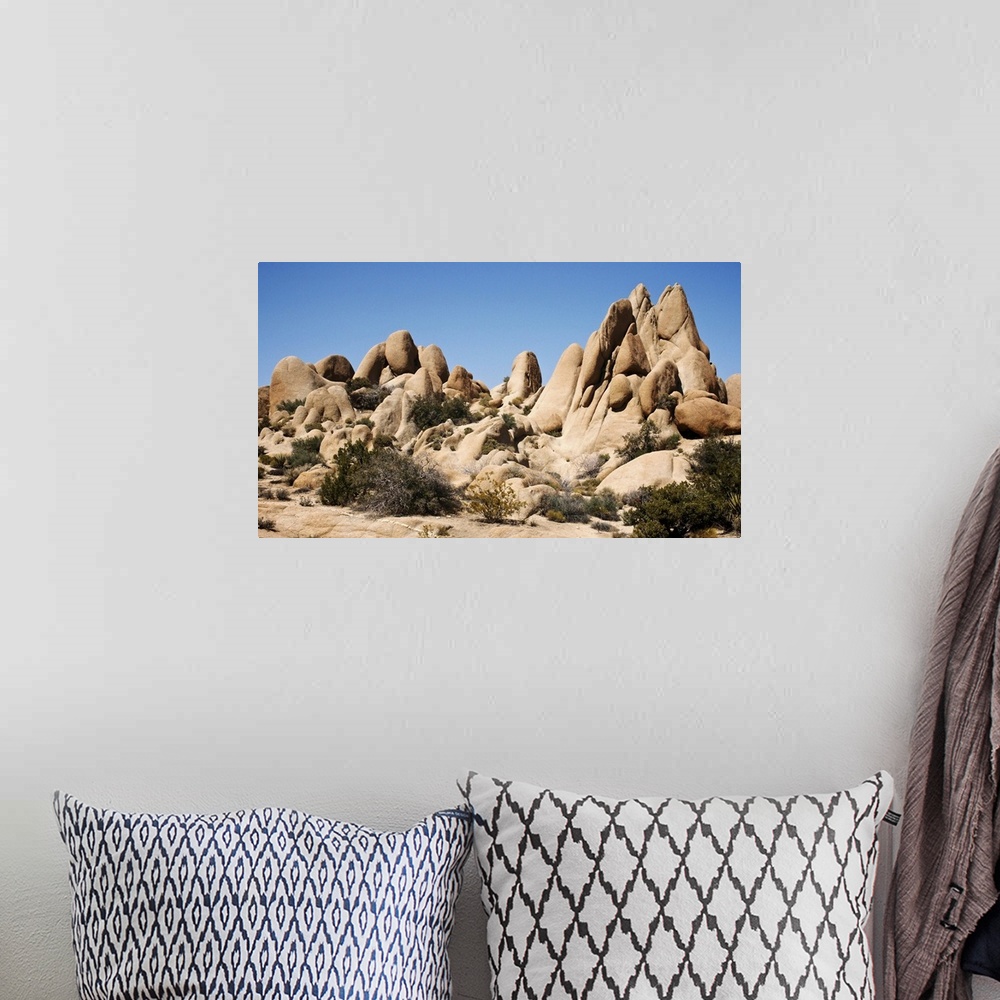 A bohemian room featuring Rock formations of Joshua Tree National Park in California.