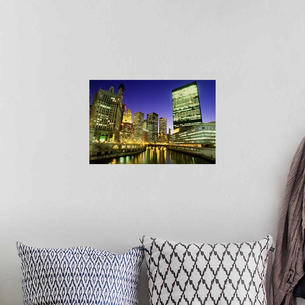 A bohemian room featuring USA, Illinois, Chicago, skyscrapers along River Chicago, dusk