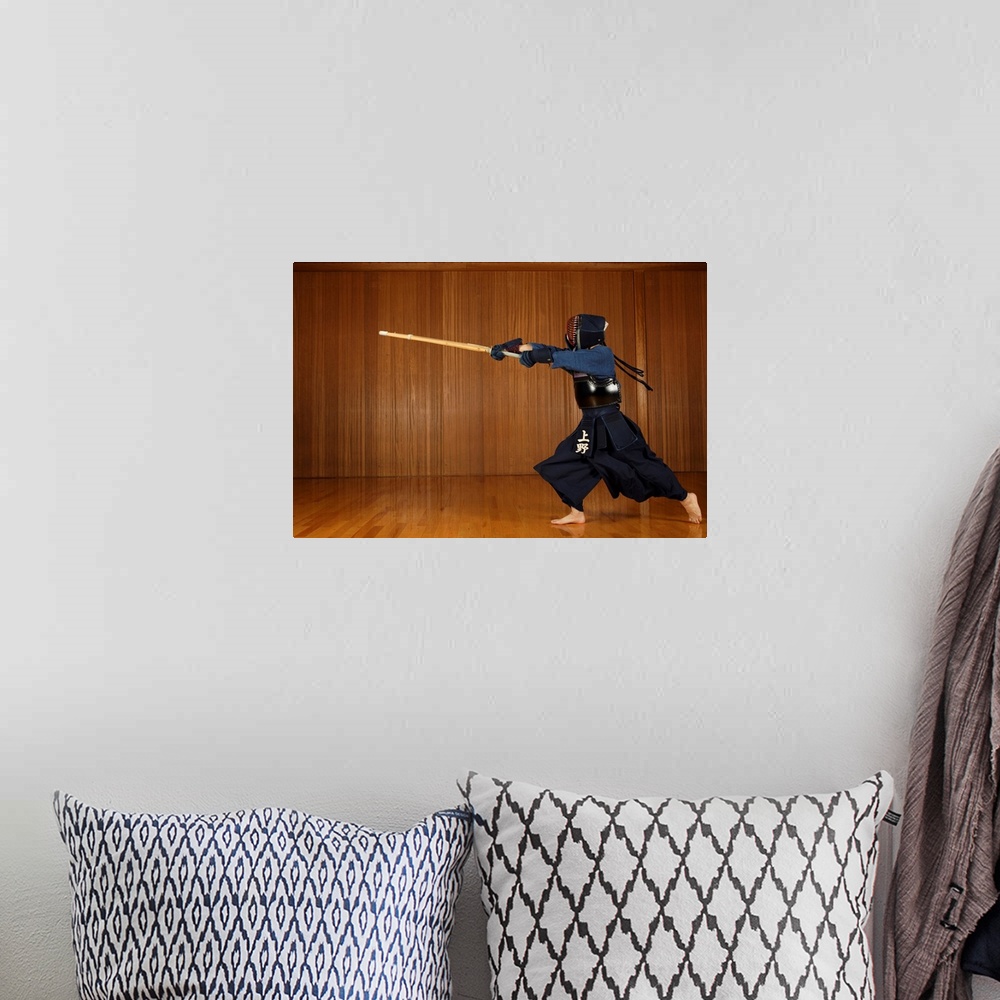 A bohemian room featuring Kendo Fencer Practicing