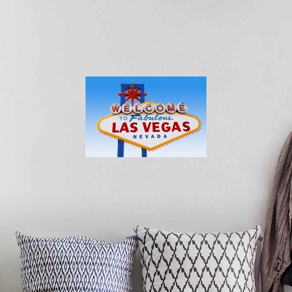A bohemian room featuring Las Vegas Welcome Road Sign