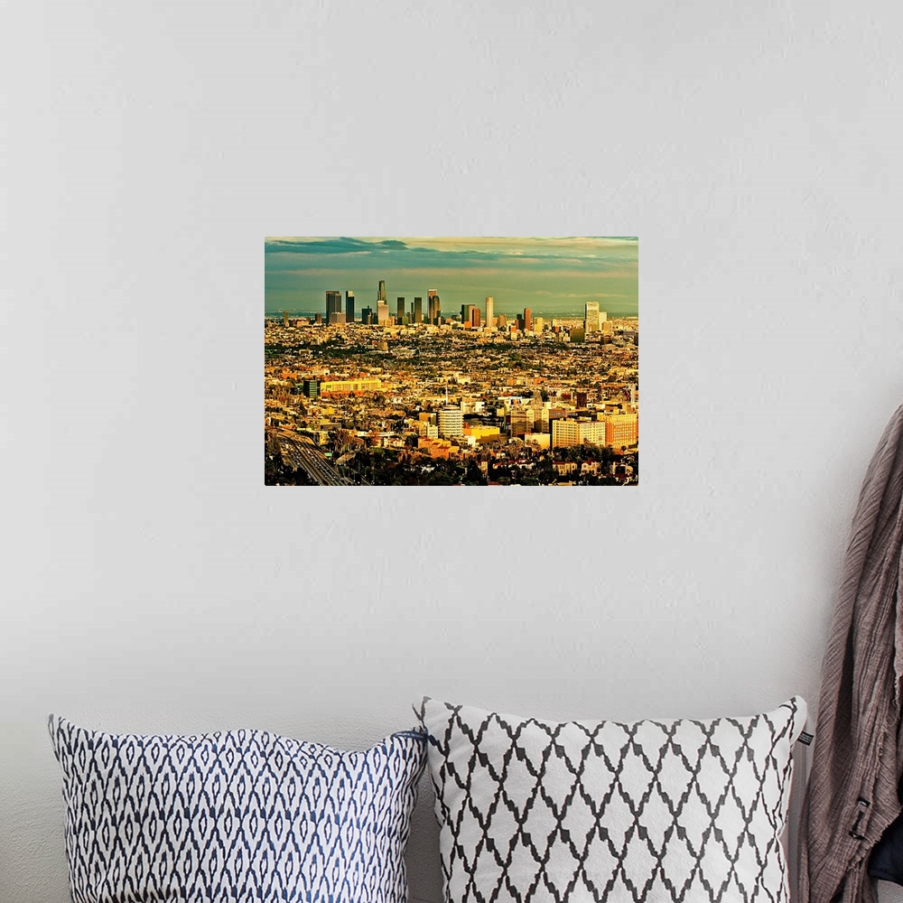 A bohemian room featuring Los Angeles from above with Hollywood in foreground and LA skyline in distance.
