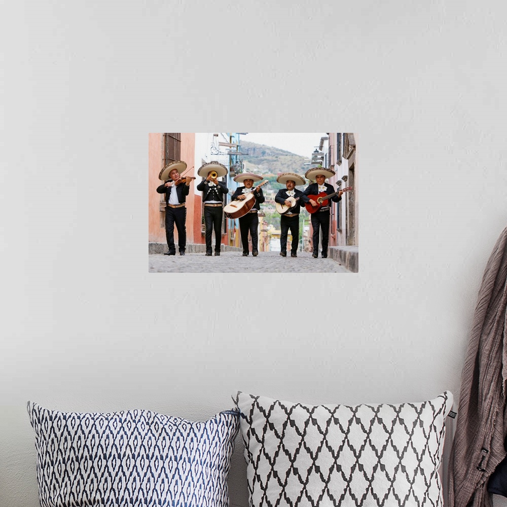A bohemian room featuring Mariachi band walking in street