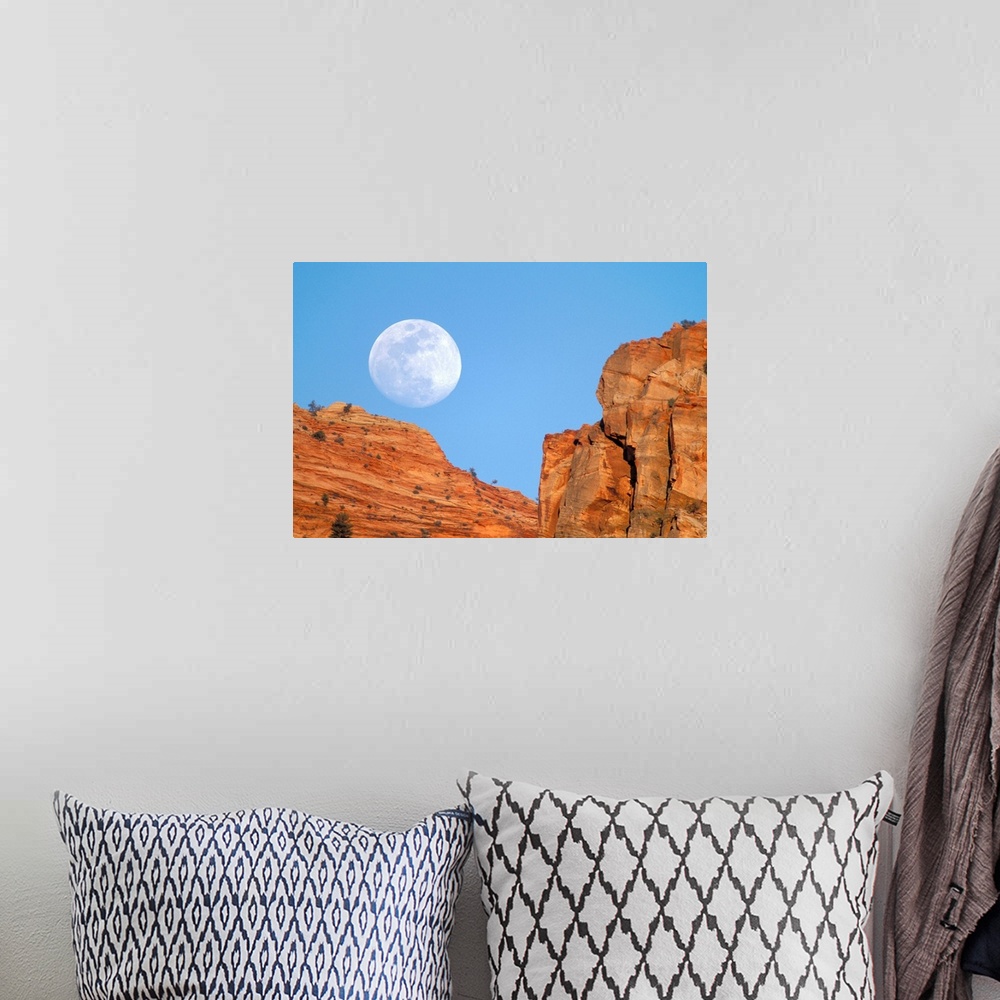 A bohemian room featuring Moonrise over cliffs of Zion Canyon.