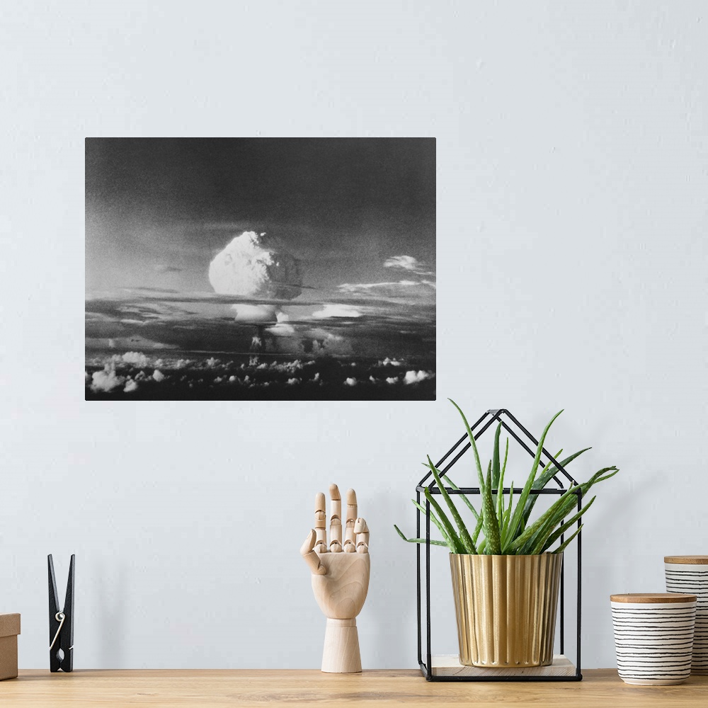 A bohemian room featuring The mushroom cloud from Ivy Mike, one of the largest nuclear blasts ever, during Operation IVY. T...