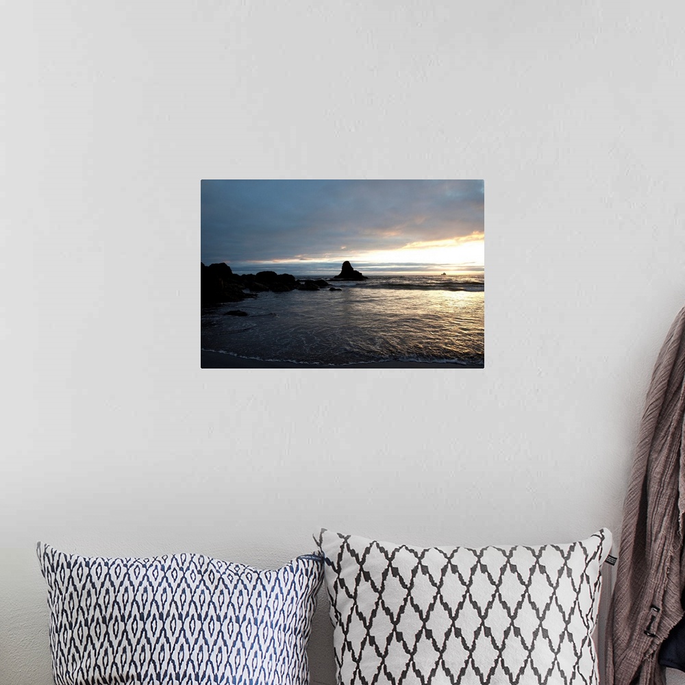 A bohemian room featuring Ocean sunset silhouettes lighthouse