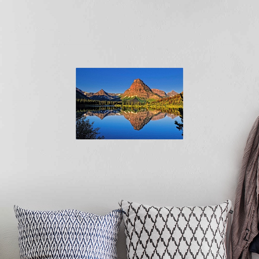 A bohemian room featuring An image from Glacier Park's Two Medicine area.Shown here is Painted Teepee mountain, stunning Mt...