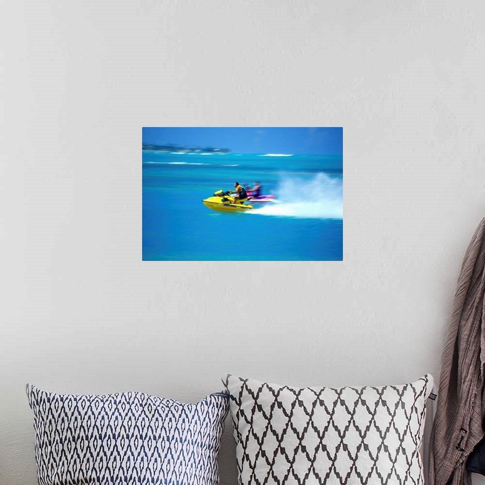 A bohemian room featuring People on wave runners near Luquillo Beach, Puerto Rico, selective focus